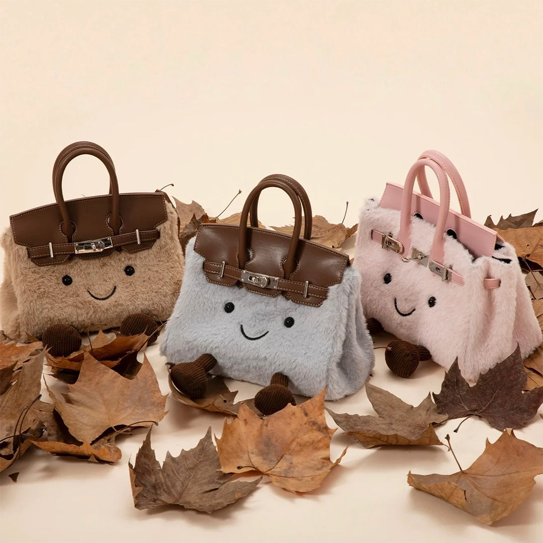 Snugg Plushie Handbag ™